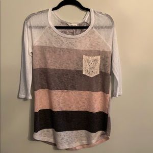 Striped shirt with lace pocket